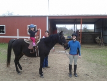 Abby (age 3) riding Blackie