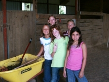 Our kids learn how to take care of horses as well as ride.