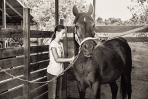 Hannah and her favorite horse Blackie